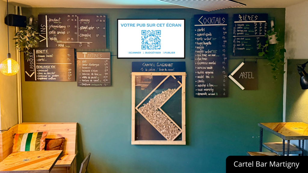 Ecran publicitaire au Cartel Bar à Martigny en Valais